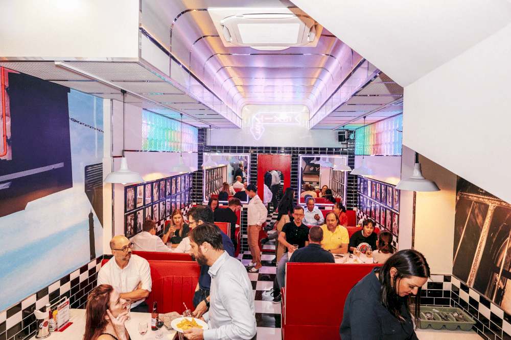 Eddie’s New York Deli & Diner embodies the classic 1950s American diner style with its vibrant red tones (Source: Eddies D1 Diner)